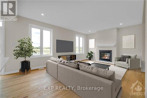 201 Elsie Macgill Walk, Ottawa, ON - Indoor Photo Showing Living Room With Fireplace