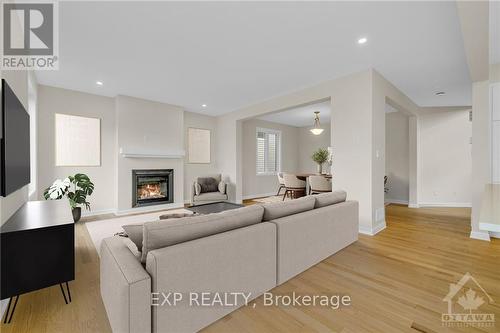 201 Elsie Macgill Walk, Ottawa, ON - Indoor Photo Showing Living Room With Fireplace