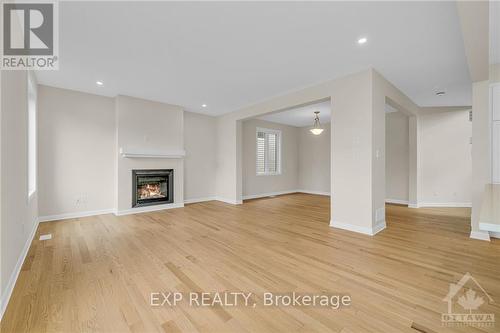 201 Elsie Macgill Walk, Ottawa, ON - Indoor Photo Showing Living Room With Fireplace