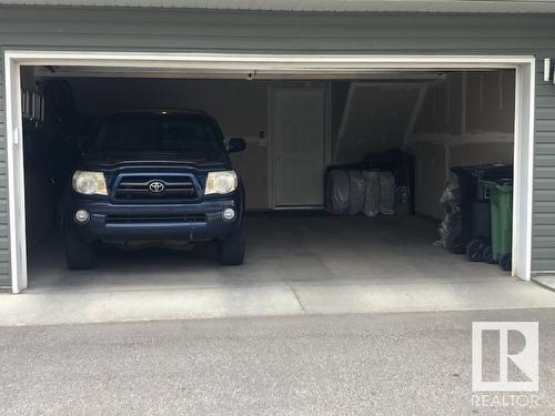 #38 5317 3 Av Sw, Edmonton, AB - Indoor Photo Showing Garage