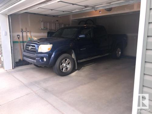 #38 5317 3 Av Sw, Edmonton, AB - Indoor Photo Showing Garage