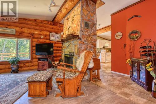 1328 Gun-A-Noot Trail, Williams Lake, BC - Indoor Photo Showing Living Room With Fireplace