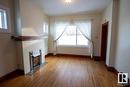 10448 84 Av Nw, Edmonton, AB  - Indoor With Fireplace 