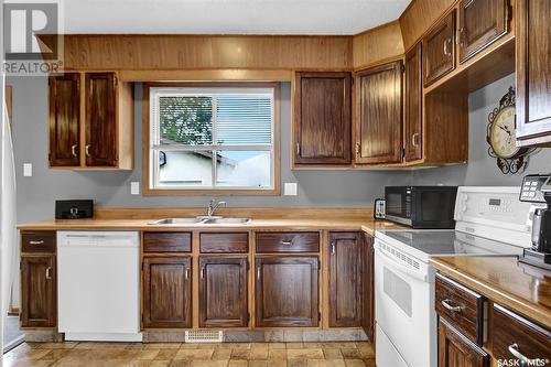 7312 1St Avenue N, Regina, SK - Indoor Photo Showing Kitchen With Double Sink