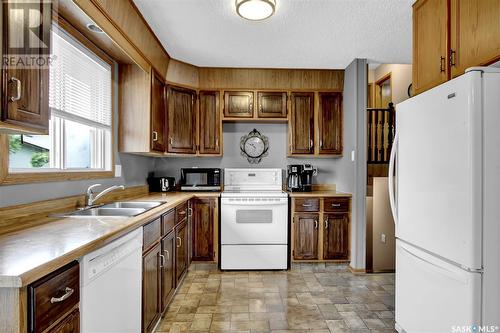 7312 1St Avenue N, Regina, SK - Indoor Photo Showing Kitchen With Double Sink