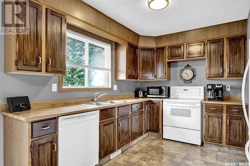 7312 1St Avenue N, Regina, SK - Indoor Photo Showing Kitchen With Double Sink