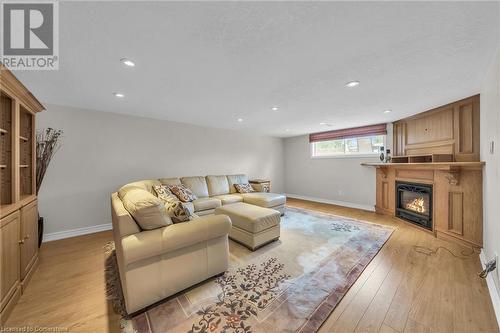 16 Lawrence Avenue, Stoney Creek, ON - Indoor Photo Showing Living Room With Fireplace