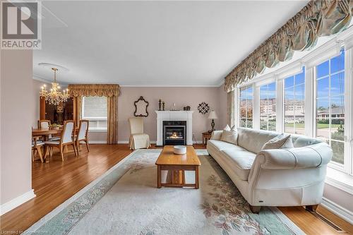 16 Lawrence Avenue, Stoney Creek, ON - Indoor Photo Showing Living Room With Fireplace