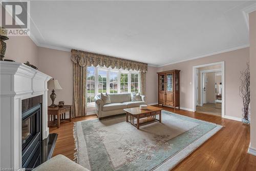 16 Lawrence Avenue, Stoney Creek, ON - Indoor Photo Showing Living Room With Fireplace