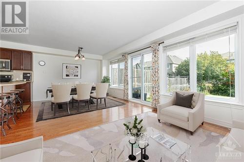 Dining room; this photo has been digitally staged - 507 Cherokee Way, Stittsville, ON - Indoor Photo Showing Living Room