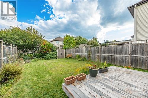 Plenty of space for gardens or play area - 507 Cherokee Way, Stittsville, ON - Outdoor With Deck Patio Veranda