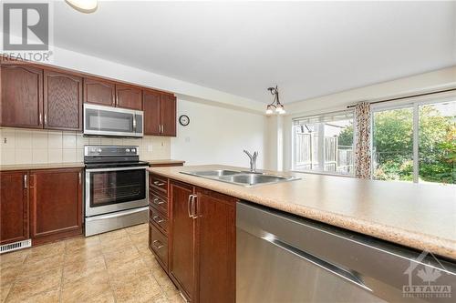 507 Cherokee Way, Stittsville, ON - Indoor Photo Showing Kitchen With Double Sink