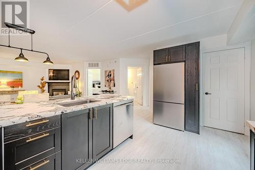 301 - 1441 Walker'S Line, Burlington, ON - Indoor Photo Showing Kitchen With Double Sink