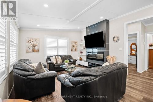 4449 Milburough Line/ 8 Poplar Street, Burlington, ON - Indoor Photo Showing Living Room With Fireplace