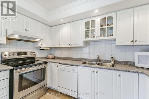 809 - 5080 Pinedale Avenue, Burlington, ON - Indoor Photo Showing Kitchen With Double Sink