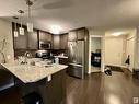 #210 2207 44 Av Nw, Edmonton, AB  - Indoor Photo Showing Kitchen With Stainless Steel Kitchen With Double Sink With Upgraded Kitchen 