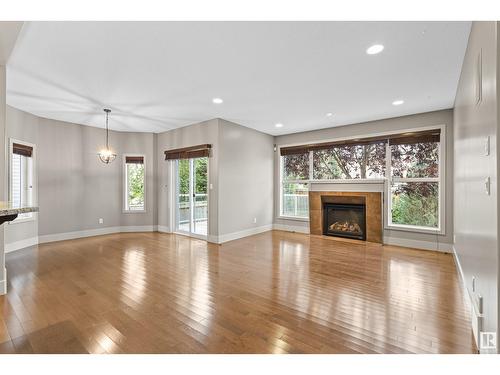 5406 Mcluhan End En Nw, Edmonton, AB - Indoor Photo Showing Living Room With Fireplace