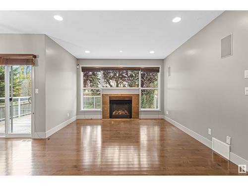 5406 Mcluhan End En Nw, Edmonton, AB - Indoor Photo Showing Living Room With Fireplace