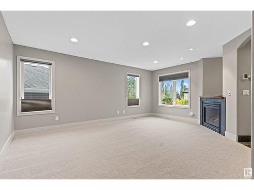 5406 Mcluhan End En Nw, Edmonton, AB - Indoor With Fireplace