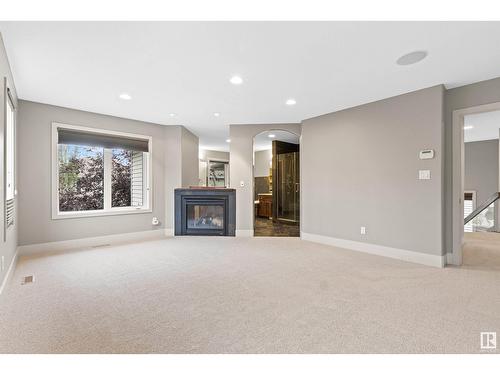 5406 Mcluhan End En Nw, Edmonton, AB - Indoor Photo Showing Living Room With Fireplace