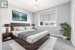 Virtually staged third bedroom on second level - 