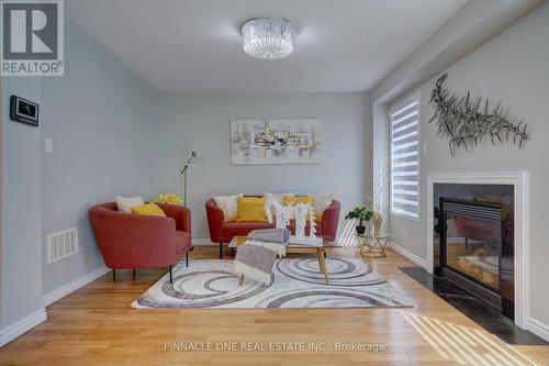 15 Thackery Drive, Ajax, ON - Indoor Photo Showing Living Room With Fireplace