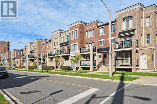 95 - 100 Parrotta Drive, Toronto, ON - Outdoor With Balcony With Facade