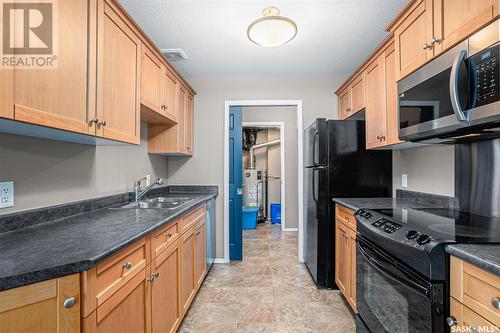 132 410 Stensrud Road, Saskatoon, SK - Indoor Photo Showing Kitchen With Double Sink