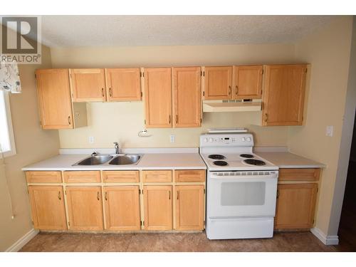 301 11Th  S Street, Cranbrook, BC - Indoor Photo Showing Kitchen With Double Sink