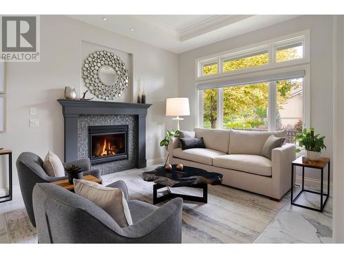 4480 Gallaghers Forest S, Kelowna, BC - Indoor Photo Showing Living Room With Fireplace