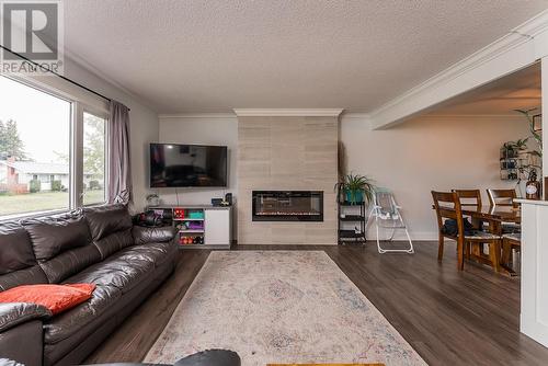 943 Vedder Crescent, Prince George, BC - Indoor Photo Showing Living Room With Fireplace