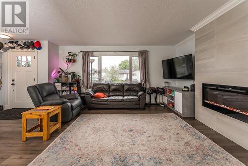 943 Vedder Crescent, Prince George, BC - Indoor Photo Showing Living Room With Fireplace