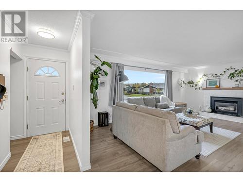 206 N Ogilvie Street, Prince George, BC - Indoor Photo Showing Living Room With Fireplace