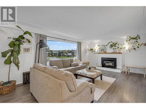 206 N Ogilvie Street, Prince George, BC - Indoor Photo Showing Living Room With Fireplace