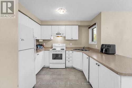 15 Lenthall Avenue, Toronto, ON - Indoor Photo Showing Kitchen With Double Sink