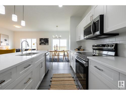 980 Daniels Lo Sw, Edmonton, AB - Indoor Photo Showing Kitchen With Double Sink With Upgraded Kitchen