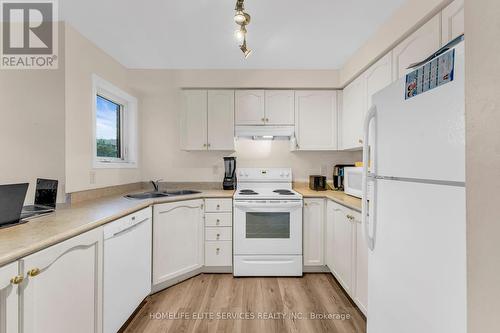 11 Lenthall Avenue, Toronto, ON - Indoor Photo Showing Kitchen With Double Sink