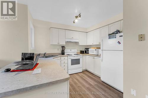 11 Lenthall Avenue, Toronto, ON - Indoor Photo Showing Kitchen With Double Sink