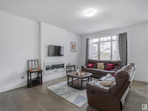 272 Fraser Wy Nw, Edmonton, AB - Indoor Photo Showing Living Room With Fireplace