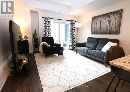 212 - 650 Gordon Street, Whitby, ON - Indoor Photo Showing Living Room