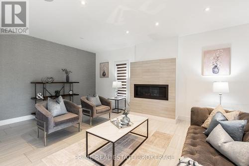 1157 Eagletrace Drive, London, ON - Indoor Photo Showing Living Room With Fireplace