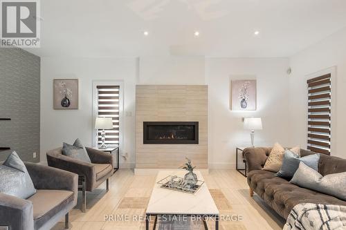 1157 Eagletrace Drive, London, ON - Indoor Photo Showing Living Room With Fireplace