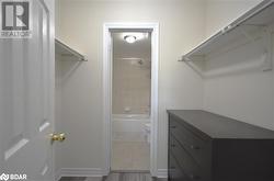 Primary Bedroom Walk In Closet - 