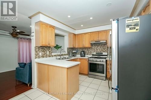 4 Lake Louise Drive, Brampton, ON - Indoor Photo Showing Kitchen With Double Sink