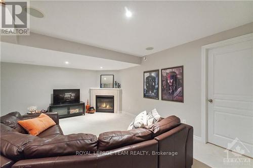 246 Tandalee Crescent, Ottawa, ON - Indoor Photo Showing Living Room With Fireplace