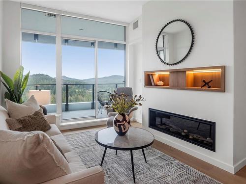 1410-2000 Hannington Rd, Langford, BC - Indoor Photo Showing Living Room With Fireplace