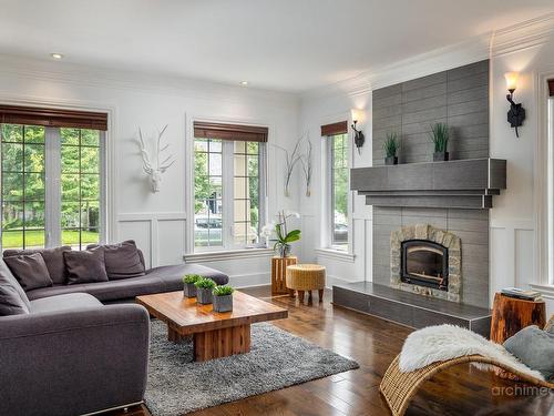 Living room - 35 Rue Des Liards, Blainville, QC - Indoor Photo Showing Living Room With Fireplace