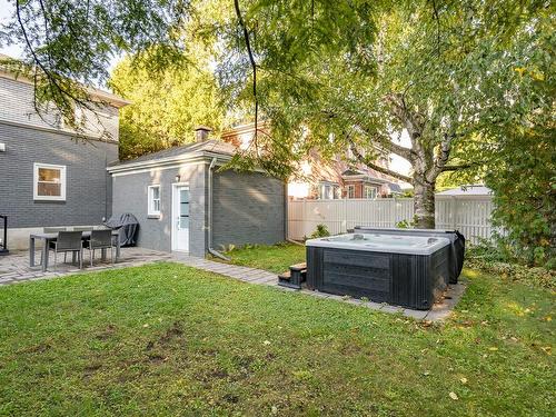 Backyard - 11831 Rue Lavigne, Montréal (Ahuntsic-Cartierville), QC - Outdoor With Backyard