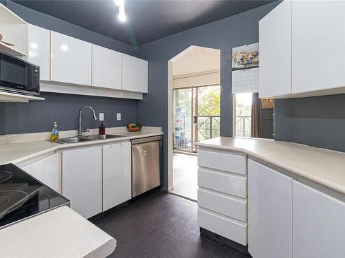 212-935 Johnson St, Victoria, BC - Indoor Photo Showing Kitchen With Stainless Steel Kitchen With Double Sink