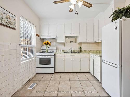 19 Curzon St, Toronto, ON - Indoor Photo Showing Kitchen With Double Sink